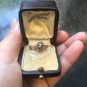 Victorian gold buckle ring with mine cut diamonds